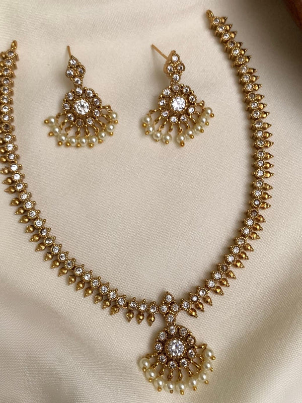 beautiful traditional white stone attigai set