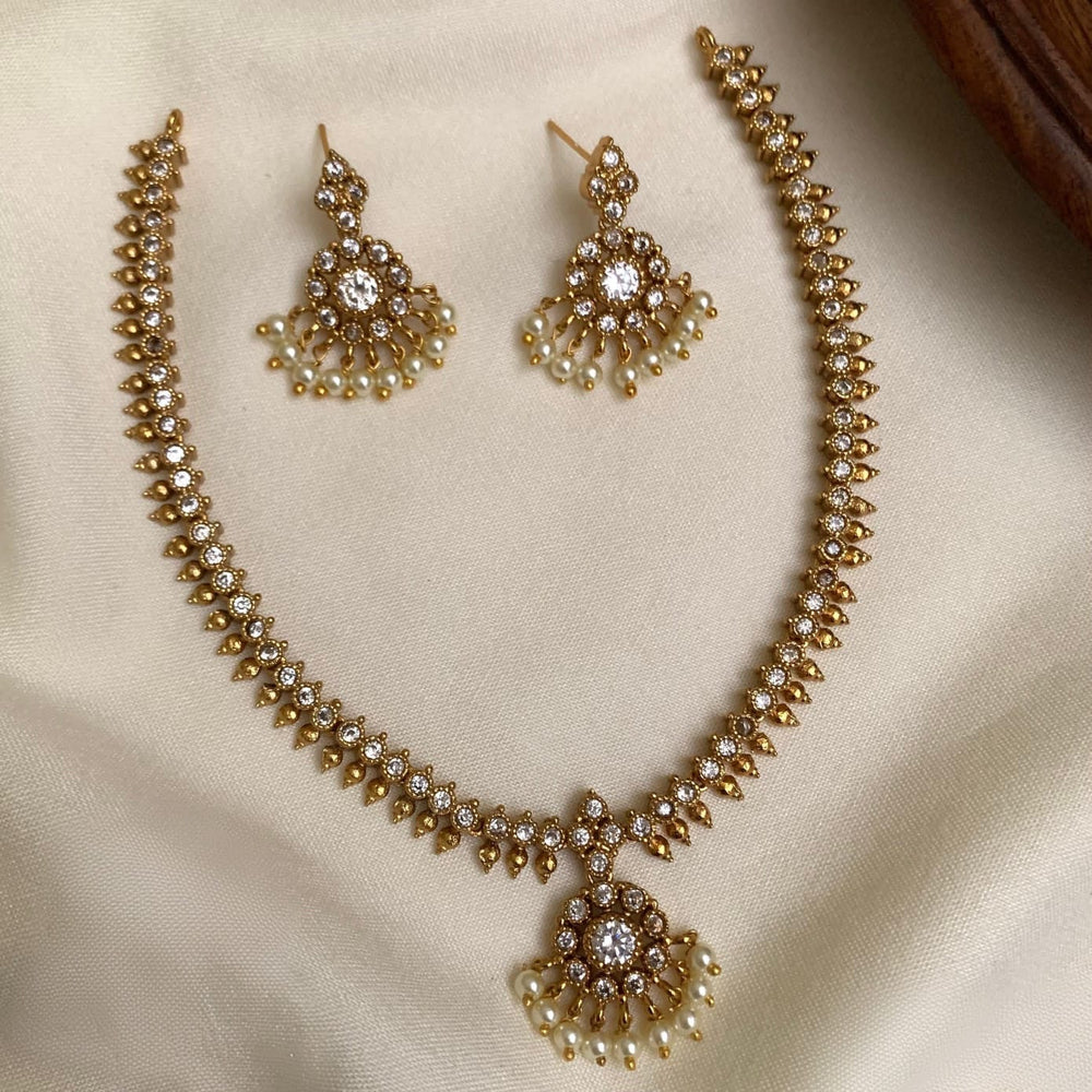 beautiful traditional white stone attigai set